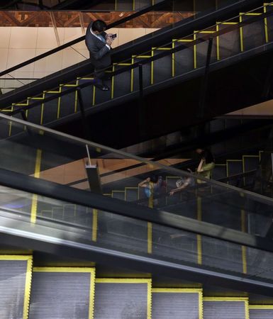 成長率見通し、１．２％に下方修正 増税影響で内閣府