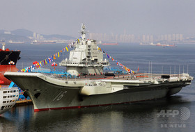 中国軍、初の国産空母建造を公表 海洋進出の拡大狙いか