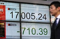 東京株、１万７０００円割れ寸前＝米国株安など嫌気、一時７００円超安