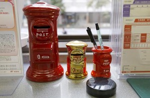 アングル:ゆうちょ銀、マイナス金利と限度額上げの二重苦