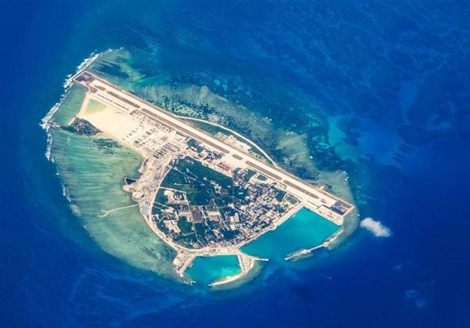 中国政府 ミサイル部隊展開確認避ける