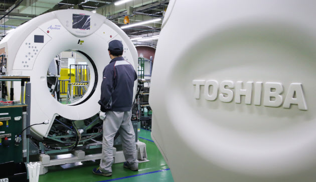 医療機器、欧米大手を追う キヤノンが東芝子会社買収